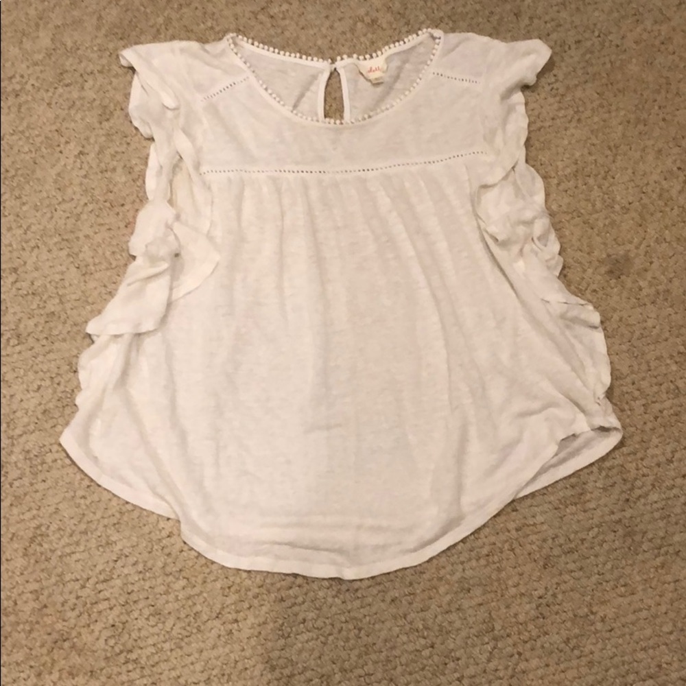 White top with ruffle detail on sides. Size small.